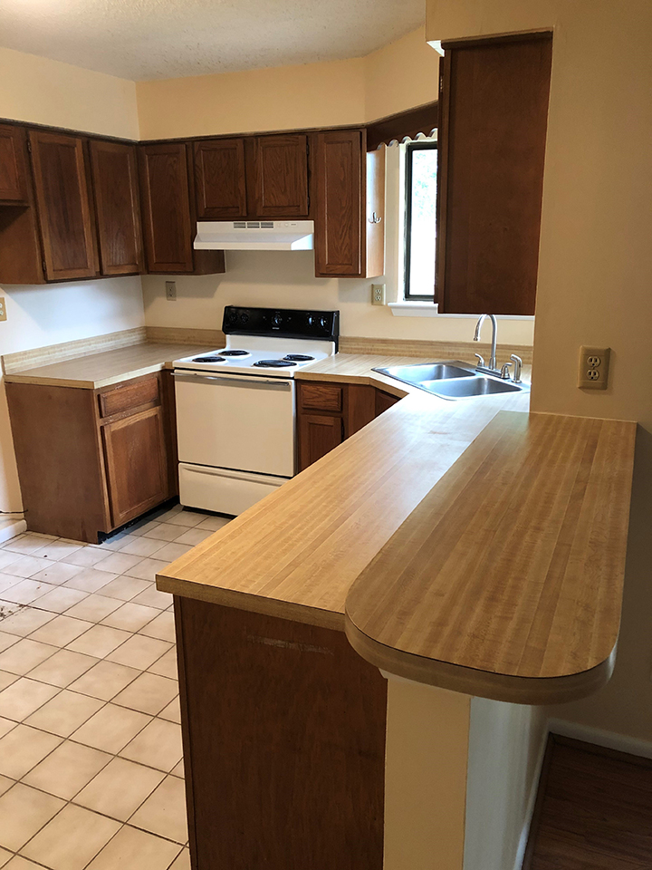 Before and after pic of kitchen countertop resurfacing