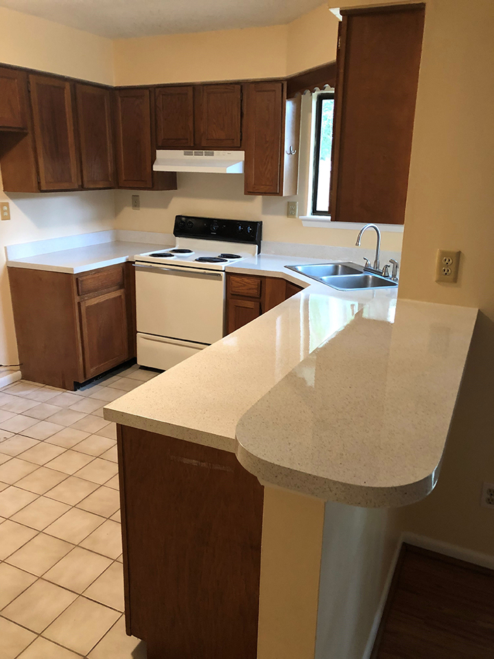 Before and after pic of kitchen countertop resurfacing